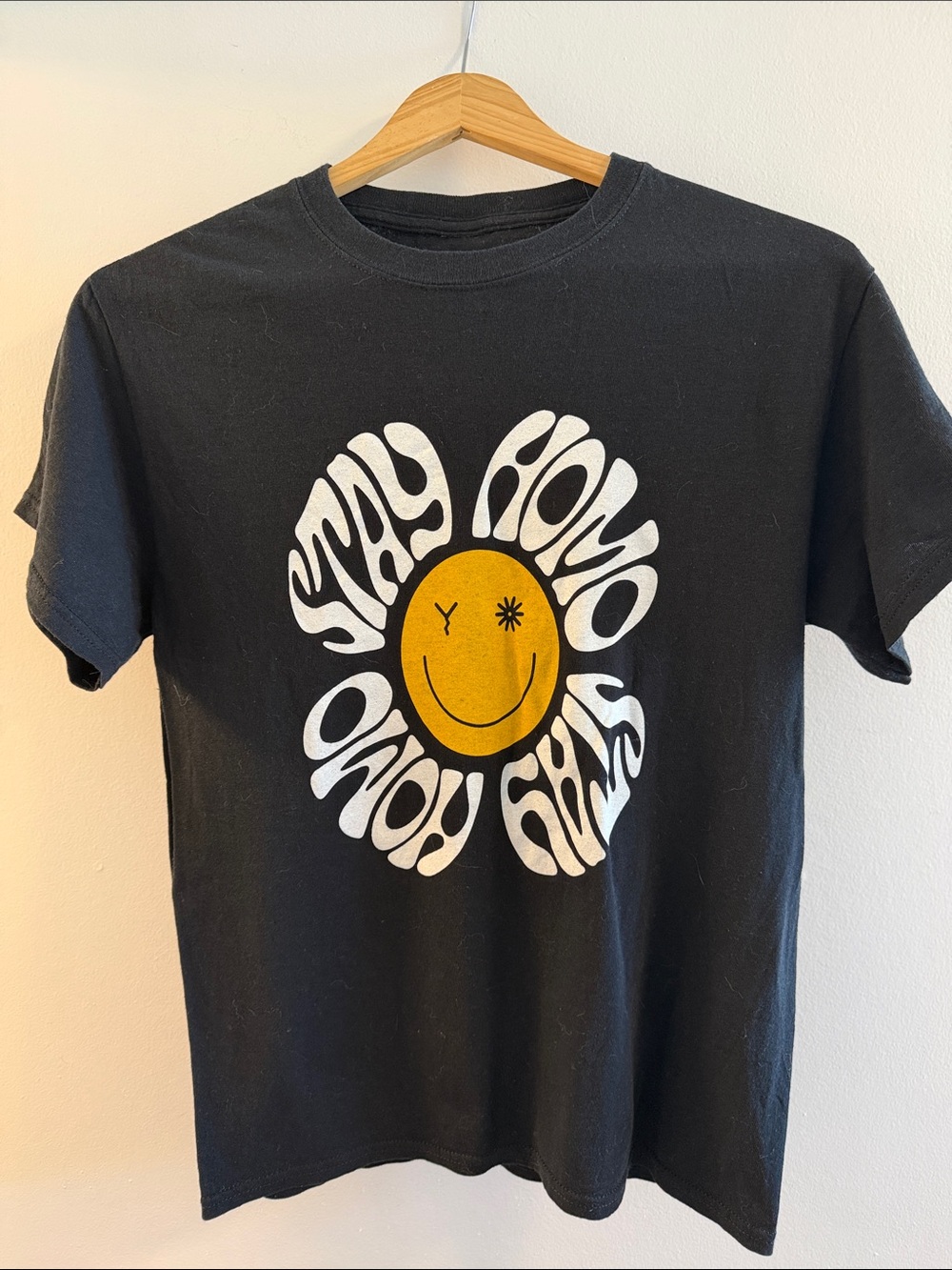 Black Graphic Tee with Yellow Smiley Daisy